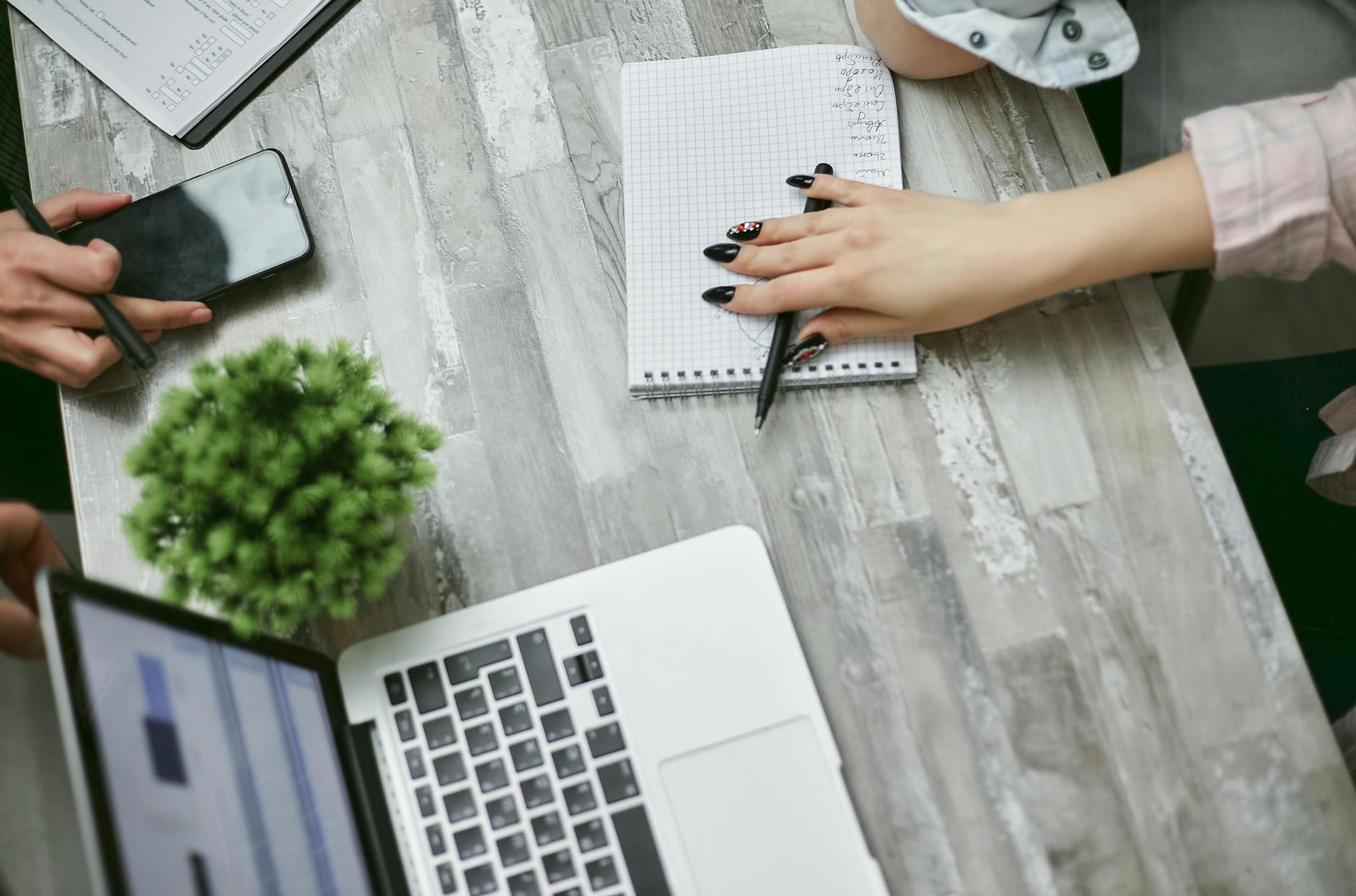 overhead shot of people at a meeting